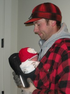 Aubrey's first day on the job as assistant shepherd. Note dad's matching plaid jacket and cap